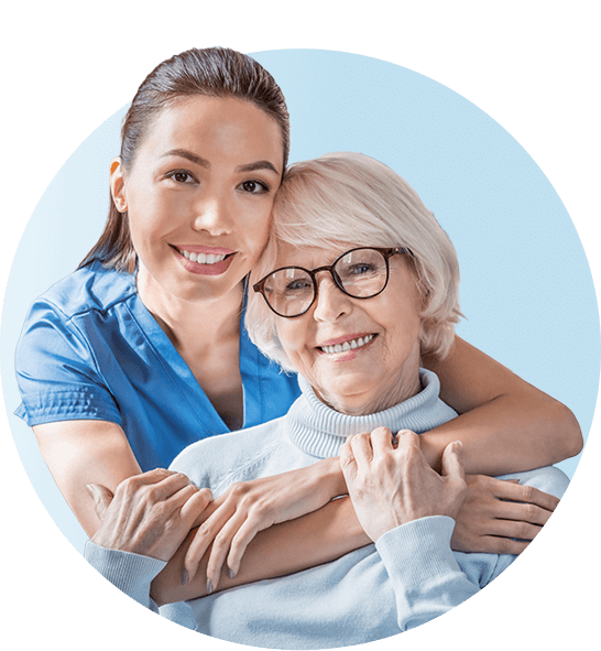 Smiling nurse and patient hugging