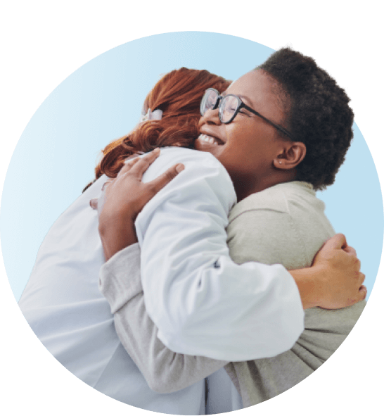 Pharmacist hugging patient